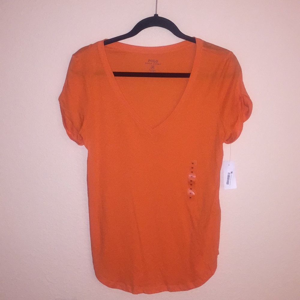 Ralph Lauren orange short sleeve top.